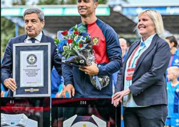Cristiano Ronaldo receives Guinness World Records certificate after becoming first male player to reach 200 international appearances (Photos)